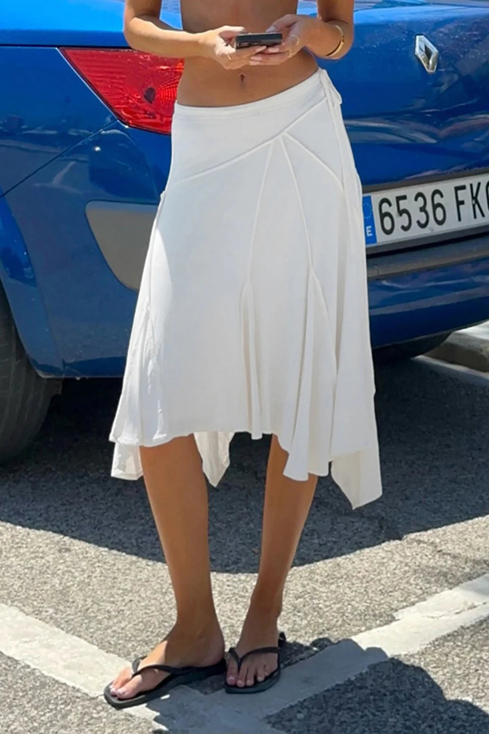 Solid Color Pleated Asymmetric Midi Skirt